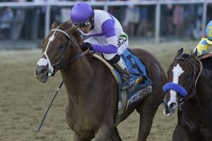 I'll Have Another winning the 2012 Preakness Stakes. Photo Courtesy: Eric Kalet