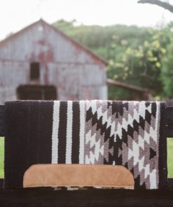 The Dolly Western Saddle rug, a premium saddle blanket for western riders.